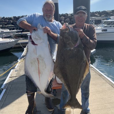 That's me on the left with the white halibut.